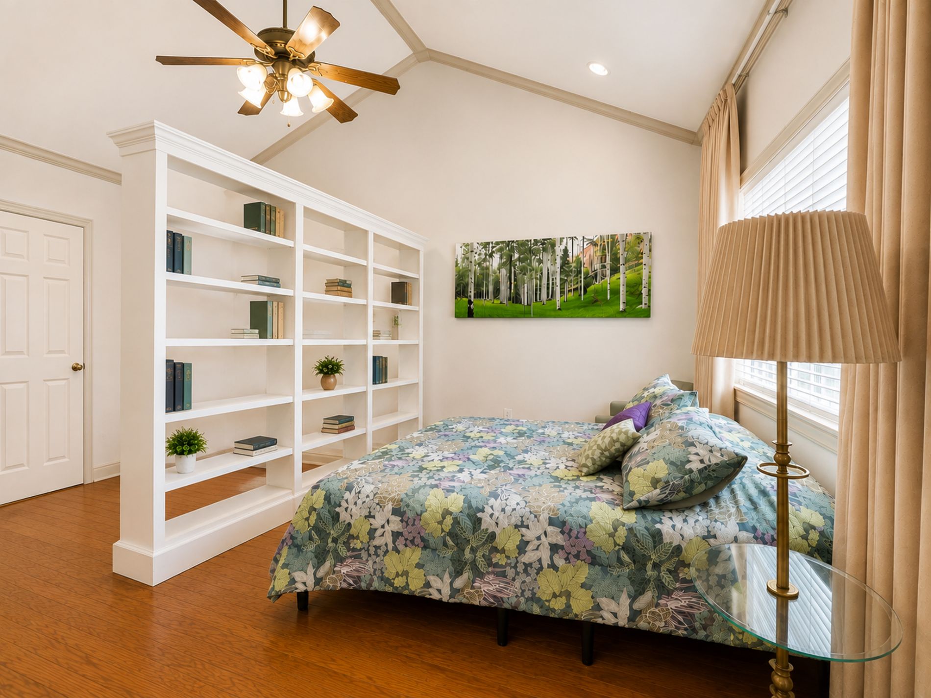 Large primary bedroom with vaulted ceiling